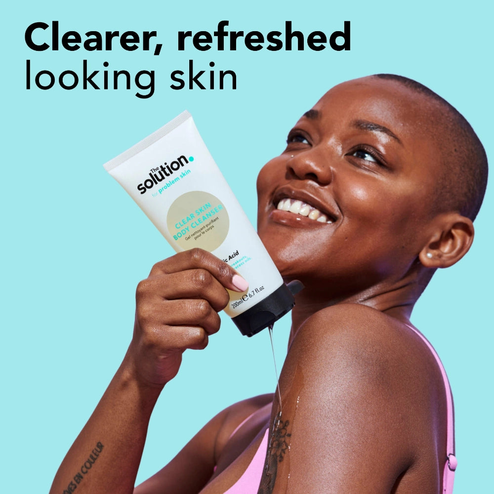 Model applying The Solution Salicylic Acid Clear Skin Body Cleanser with text: clearer, refreshed looking skin